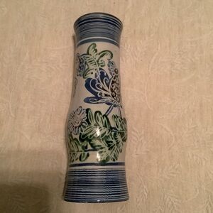 Beautiful clay vase painted with birds and flowers